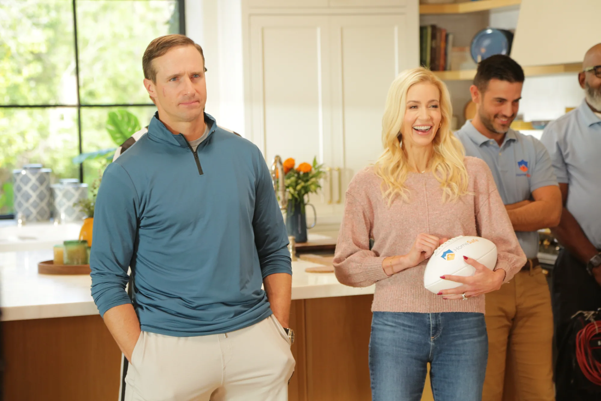 On-camera performers together on a kitchen set